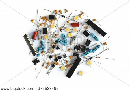 Group Of Various Electronic Components On White Background. Close-up, Top View
