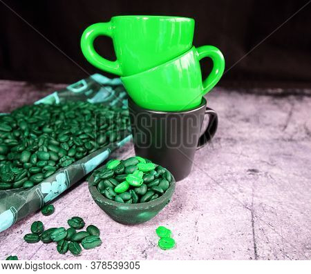 Ceramic Espresso Cups And A Lot Of Coffee Beans