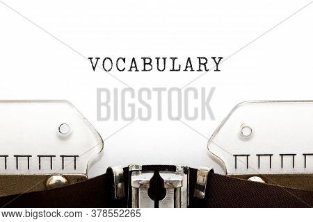 The Word Vocabulary Typed On Vintage Typewriter With Copy Space.