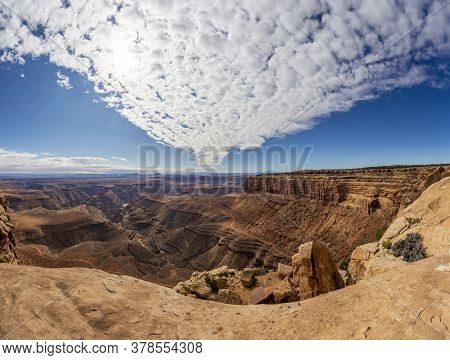 View Over San Juan River Canyon In Utah From Muley Point Near Monument Valley With Spectacular Cloud