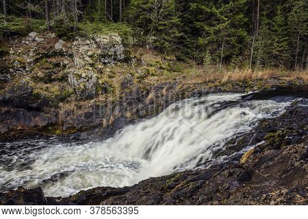 Kivach Waterfall. Powerful Stream Of Water In A Beautiful Natural Park.