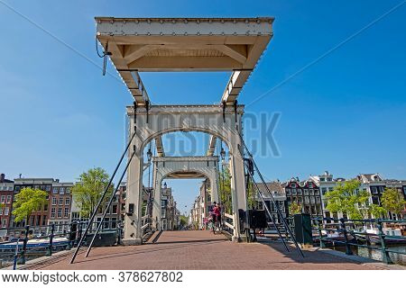 City scenic from Amsterdam with the Tiny Bridge in the Netherlands
