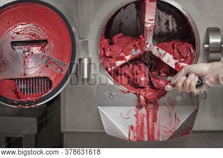 Red Fruit Ice Cream From The Ice Cream Maker Machine In The Small Manufacturing - Making Of Ice Crea
