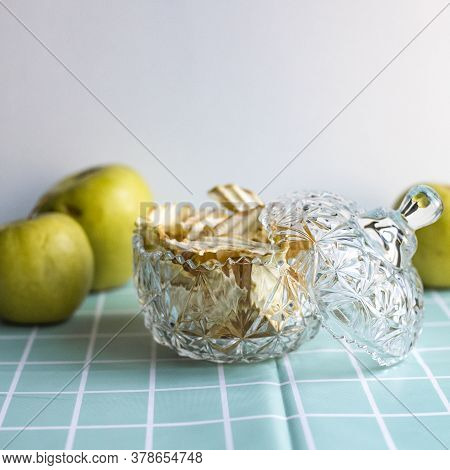 Dried Apples, Apple Chips. Healthy Snack, Diet. Dried Apples In A Vintage Plate On A Turquoise Backg