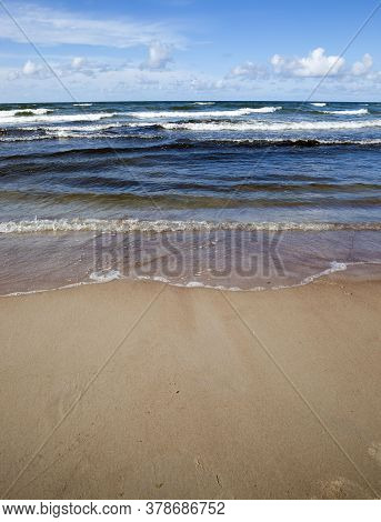 Daytime On The Baltic Sea Coast, Cold Water In The Month Of August, Beautiful Nature