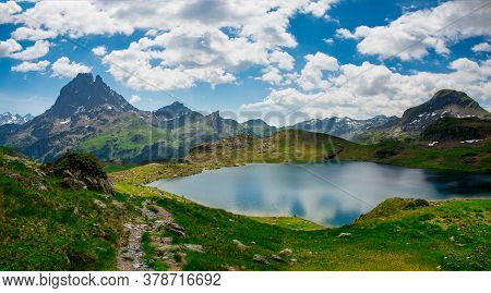 View Of Pic Du Midi Ossau And Ayous Lake In French Pyrenees Mountains