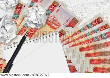 3 Cuban Pesos Convertibles Bills And Balls Of Crumpled Paper With Blank Notepad. Bad Ideas Or Less O