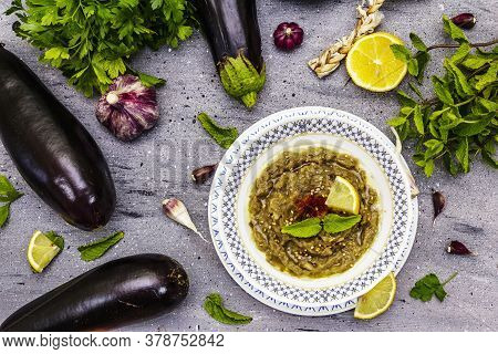 Eggplant Dip Baba Ganoush (mutabbal) Or Mezze With Ripe Vegetables And Fresh Herbs