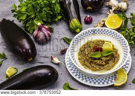 Eggplant Dip Baba Ganoush (mutabbal) Or Mezze With Ripe Vegetables And Fresh Herbs
