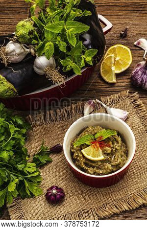 Eggplant Dip Baba Ganoush (mutabbal) Or Mezze With Ripe Vegetables And Fresh Herbs