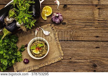 Eggplant Dip Baba Ganoush (mutabbal) Or Mezze With Ripe Vegetables And Fresh Herbs