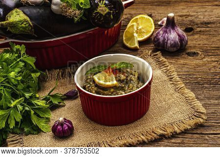 Eggplant Dip Baba Ganoush (mutabbal) Or Mezze With Ripe Vegetables And Fresh Herbs