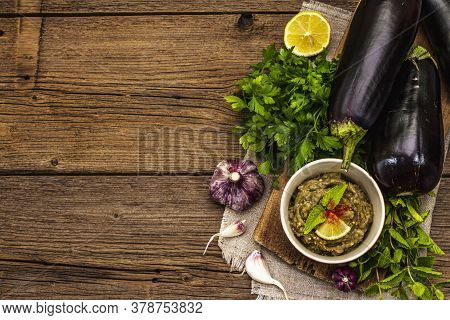 Eggplant Dip Baba Ganoush (mutabbal) Or Mezze With Ripe Vegetables And Fresh Herbs