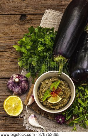 Eggplant Dip Baba Ganoush (mutabbal) Or Mezze With Ripe Vegetables And Fresh Herbs