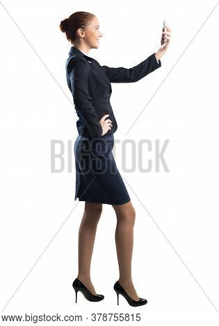 Young Beautiful Woman Taking Selfie Photo With Smartphone. Confident And Stylish Businesswoman In Da