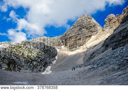 Kanin Mountain In Slovenia, Julian Alps In Summer. Ski Resort And Mountain Hiking Trail. Defocused