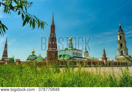 The Towers Of The Epiphany Staro-golutvin Monastery On A Sunny Summer Day Against A Blue Sky. Kolomn