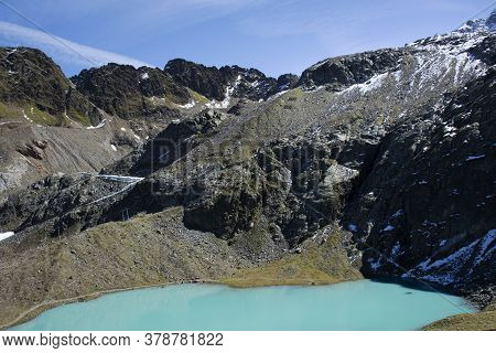 View Landscape Of Alps Mountain And Gepatsch Stausee Or Fedaia Lake For Italian People And Foreign T