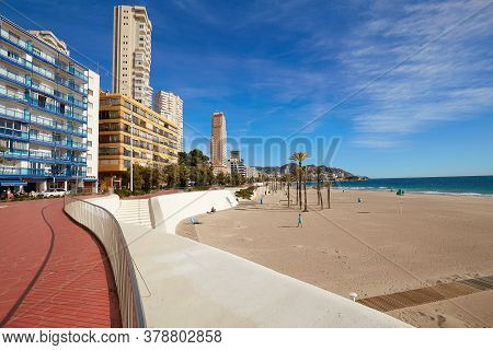 Benidorm, Alicante, Spain - November 27, 2019: People Walk Along The Fantastic Modern Promenade Of P