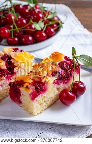 Fresh Baked Cake With Red Ripe Juicy Sour Cherry Or Kriek Berry Close Up