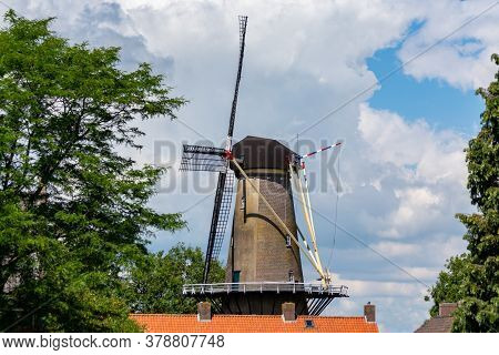 Old Dutch Windmill In Little Ancient Town With Big History Buren, Gelderland, Netherlands
