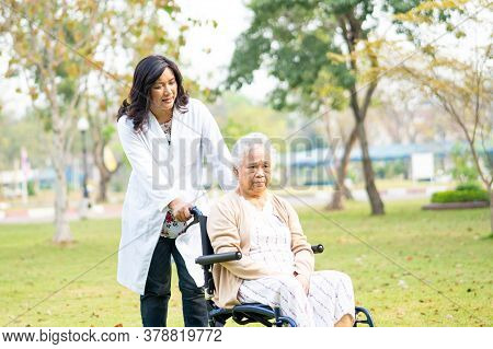 Doctor Help And Care Asian Senior Or Elderly Old Lady Woman Patient Sitting On Wheelchair At Nursing