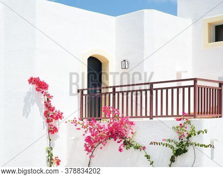 White Balcony With Bougainvillea Outdoors In Greece