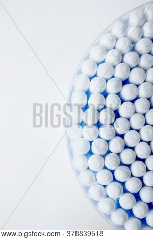 Ear Sticks With Blue Plastic On A White Background. Personal Hygiene And Self-care. Cosmetology And 