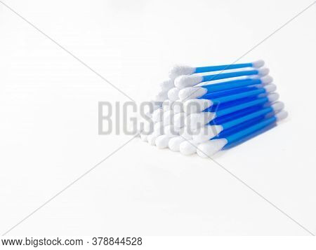 Ear Sticks With Blue Plastic On A White Background. Personal Hygiene And Self-care. Cosmetology And 