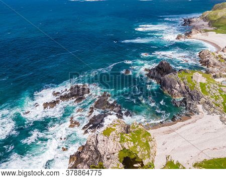 Aerial View Of The Beautiful Coast Next To Carrickabraghy Castle - Isle Of Doagh, Inishowen, County 