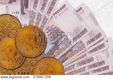 500 Russian Rubles Bills And Golden Bitcoins. Cryptocurrency Investment Concept. Crypto Mining Or Tr