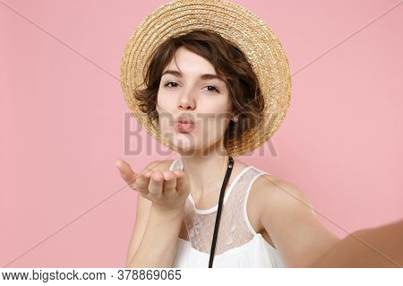 Close Up Of Pretty Tourist Woman In Dress Hat Isolated On Pink Background. Traveling To Travel Weeke