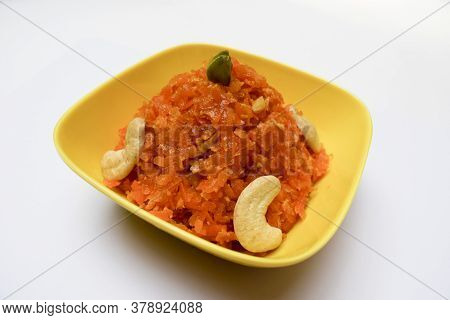 Side View Of Gajar Ka Halwa, Or Carrot Halwa A Popular Indian, Pakistani Sweet Dish Dessert, Made Of