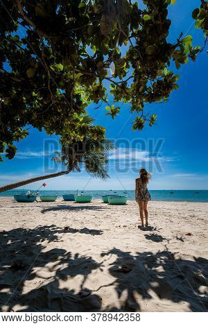 Young Sexi Woman On Palm In Vietnam
