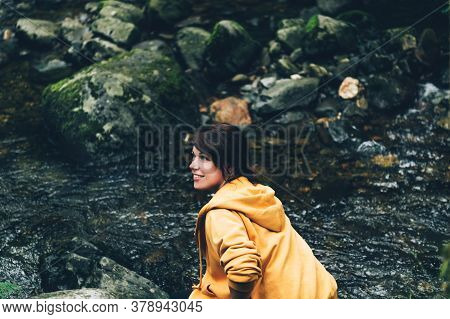 Young Woman At Aber Falls Or In Welsh Rhaeadr Fawr Is Waterfall Located About Two Miles South Of The