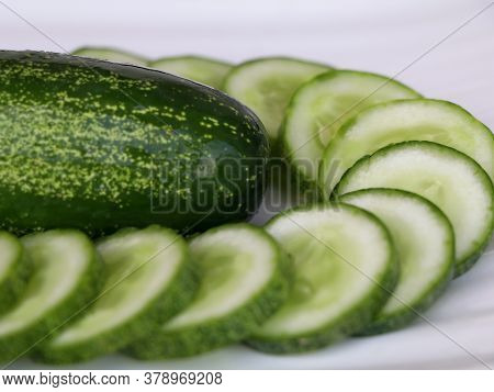Fresh Raw Cucumber With Sliced Ones