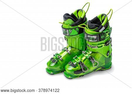 Ski Boots Isolated On White Background. Modern, Green Ski Boots. Pair Of Ski Boots Isolated On White