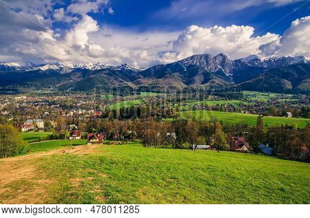 Beautiful Country View With Mountains In The Background. View Of The Tatra Mountains, Zakopane Town 