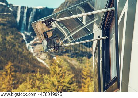 Dry Camping Next To Scenic Norwegian Waterfalls. Rv Camper Van Window Open.