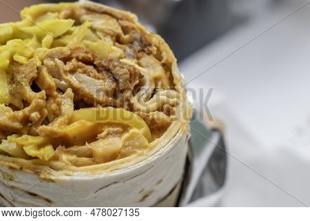 Shawarma Rolled Sandwich With Sauce And Vegetables, Arab Traditional Food. Shawarma Doner Kebab Wrap