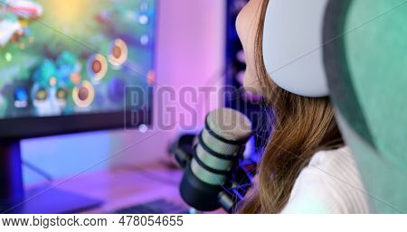 Close Up View Of Young Female Gamer Playing Online Game On Computer