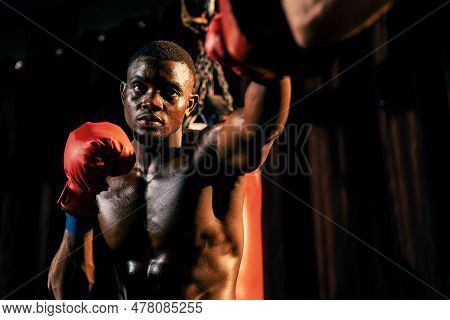 African American Black Boxer Punching At Trainer Or Coach Wearing Punching Mitts As Boxing Bag Train