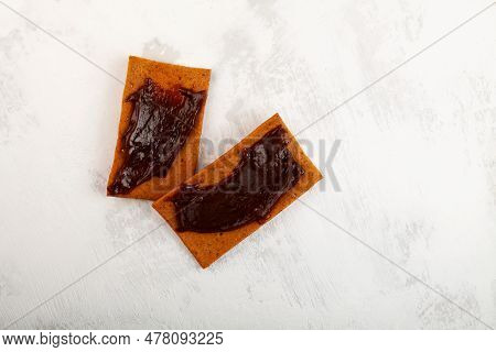 Tomato Taste Rye Crisps For Breakfast. Roasted Aussie Savory Chips With Vegemite. Vegemite Is A Very