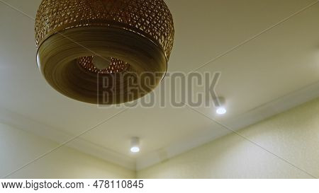 Flashing Of The Lighting Lamp In The Home Living Room. The Ceiling Lamp In The Chandelier Is Flicker