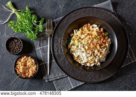 Chicken Rice Casserole D Iberville Topped With French Fried Onion And Crumbled Crackers In Black Bow