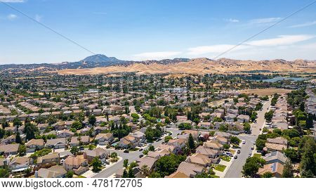 Aerial Images Over A Community In Antioch, California With Houses, Cars, Streets And Trees. With A B