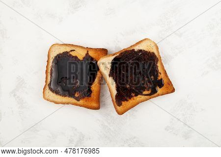 Aussie Savory Toasts For Breakfast. Vegemite Is A Very Popular Yeast Based Spread In Australia. Grey
