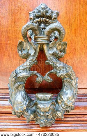 European Vintage Old Metal Wrought Iron Door Knocker. Design Detail. Paris.