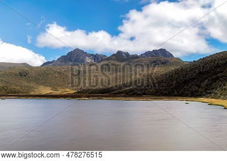 Ruminahui Volcano In The Background With The Limpiopungo Lagoon In The Foreground, On A Beautiful Su