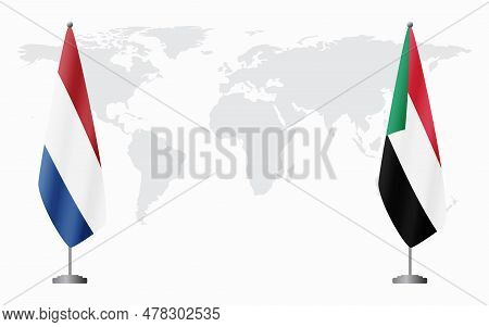 Netherlands And Sudan Flags For Official Meeting Against Background Of World Map.